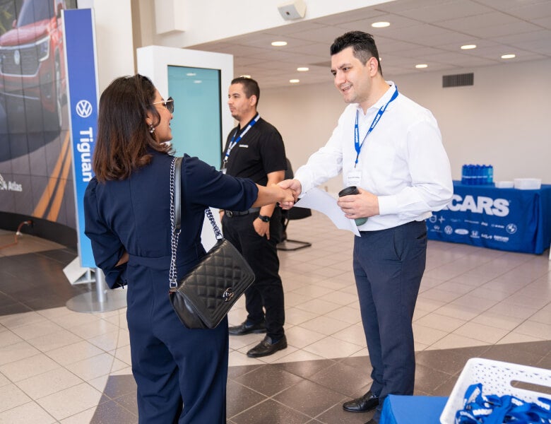 Dealership Rep. meeting with client